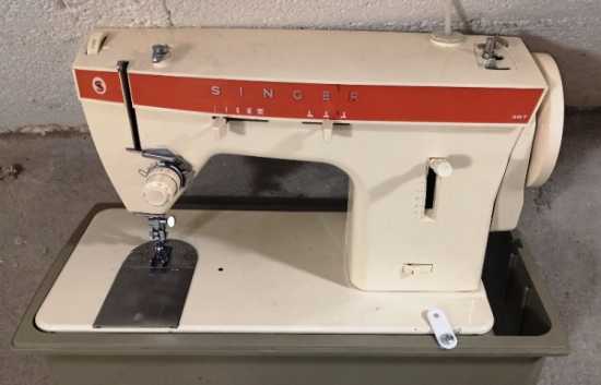 Donne machine à coudre singer
